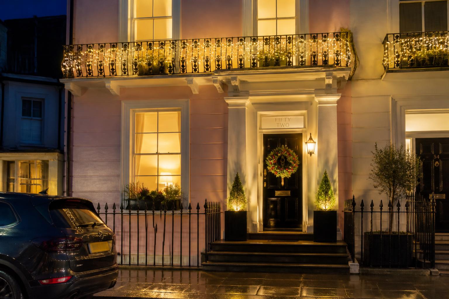 Garden-Square Terrace, Notting Hill — Notting Hill, lit with warm white Christmas lights